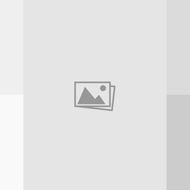 man wearing suit and tie smiling in profile photo