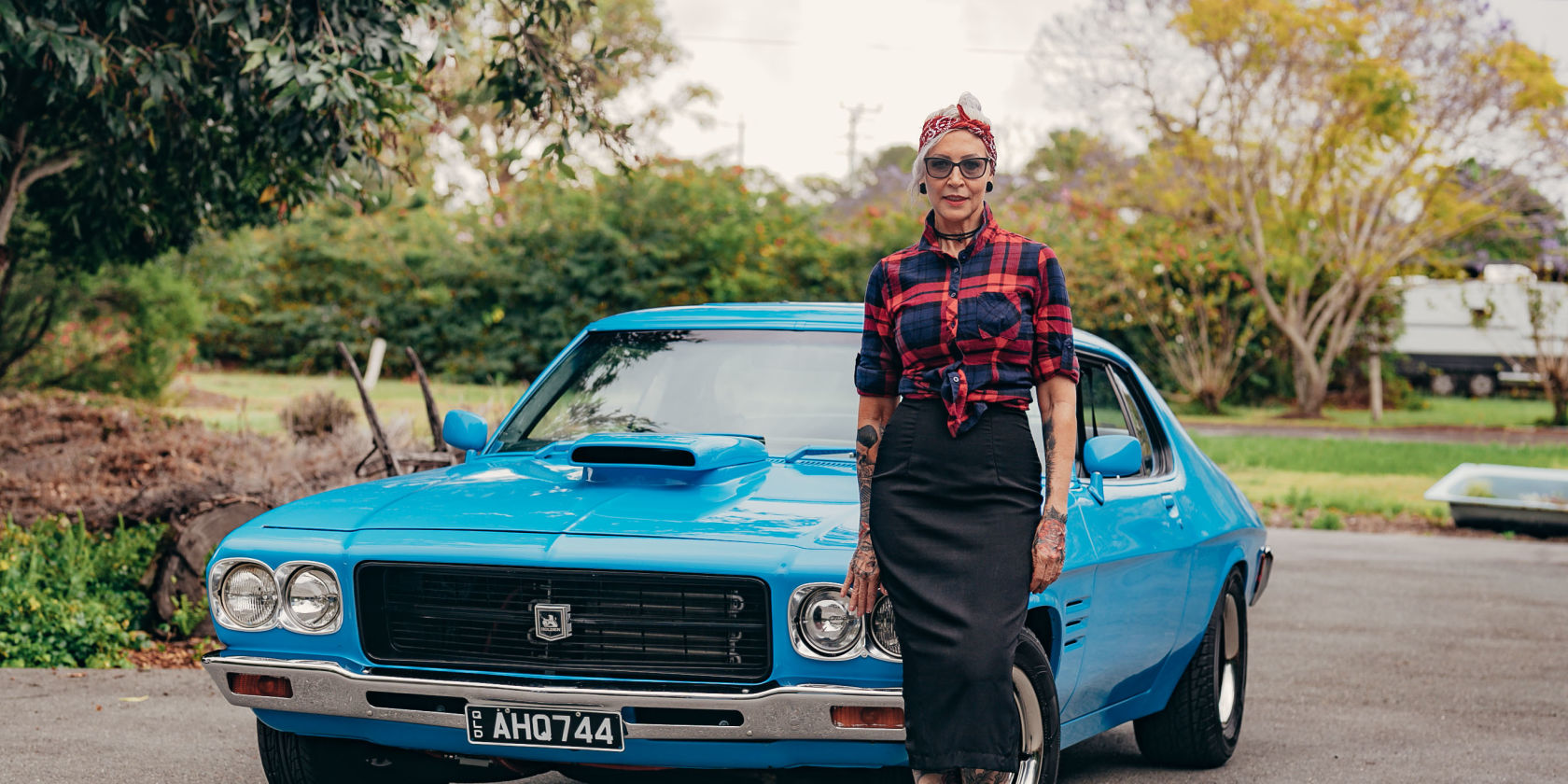 Behind the phones: Suncorp stars and vintage cars