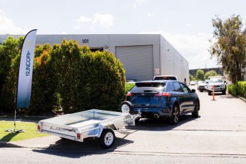 Suncorp launches major hail repair drive-through centre after storms