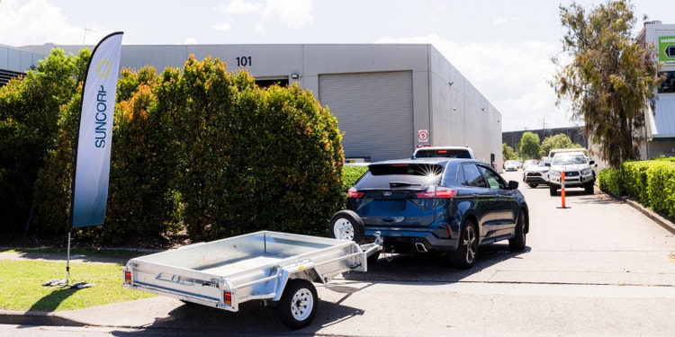 Cars lining up in driveway to enter hail assessment centre