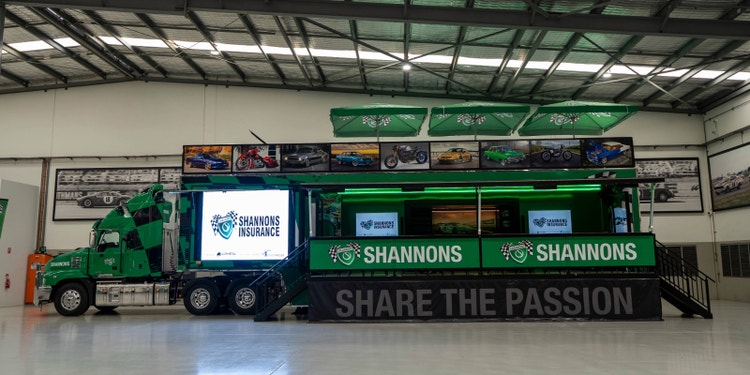 green shannons super rig truck fully displayed in shannons showroom