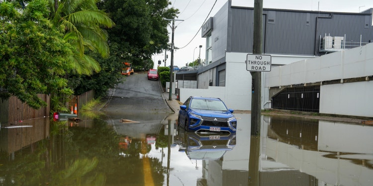 flooded road with car